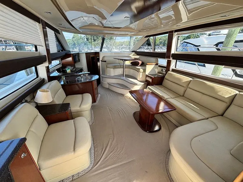 Slide: The Image of Luxurious interior of a 2011 Meridian 391 Sedan yacht with plush seating and elegant design. - 14