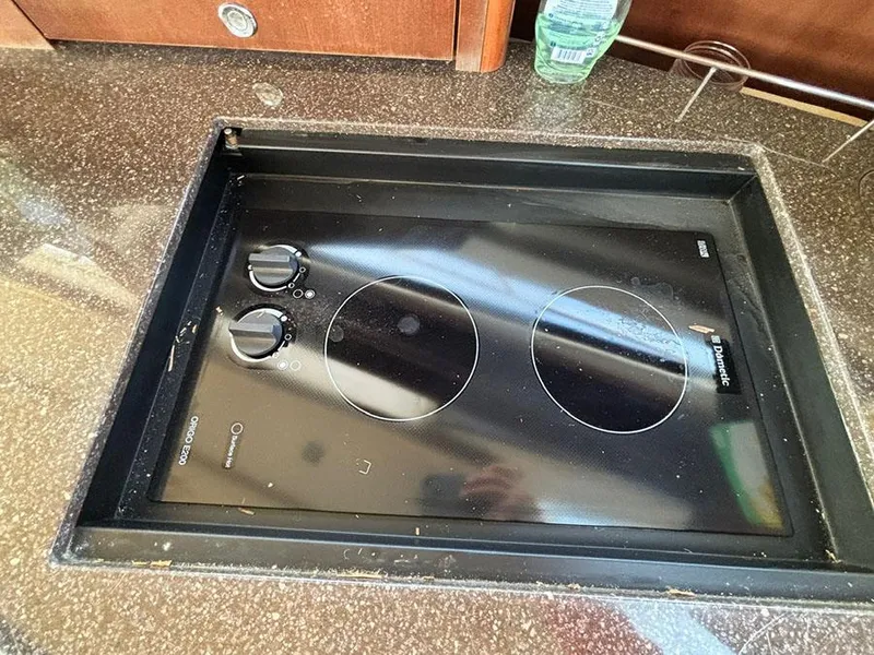 Slide: The Image of Built-in cooktop on 2011 Meridian 391 Sedan yacht kitchen counter. - 19