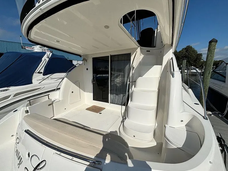 Slide: The Image of 2011 Meridian 391 Sedan yacht with spacious deck and elegant staircase. - 4