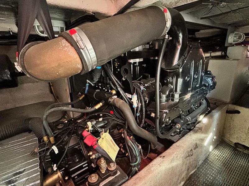 Slide: The Image of Engine compartment of a 2011 Meridian 391 Sedan boat, showcasing detailed mechanical components. - 8