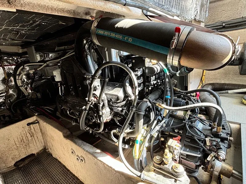 Slide: The Image of Engine compartment of a 2011 Meridian 391 Sedan boat, showcasing intricate mechanical components. - 9