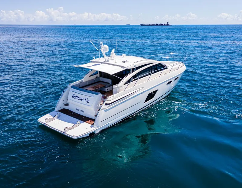 Slide: The Image of Luxury 2015 Princess V52 yacht cruising on open sea. - 3