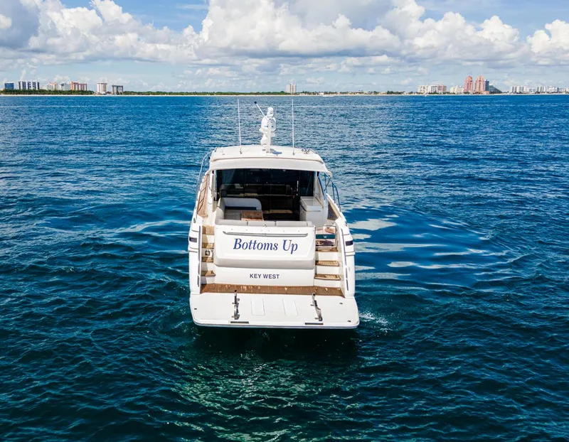Slide: The Image of Luxury Princess V52 yacht on open water, 2015 model, named "Bottoms Up," Key West. - 4