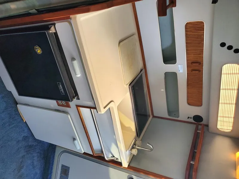 Slide: The Image of Stbd Galley with sink, stove & fridge - 16