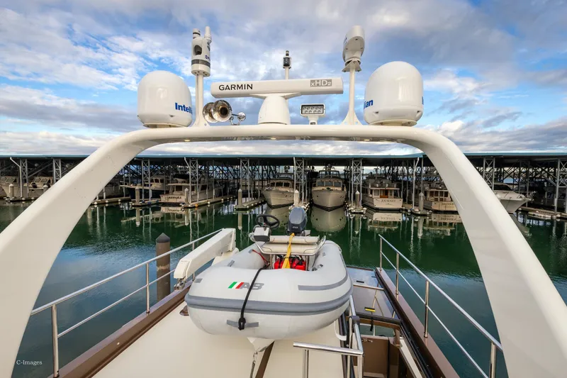 Slide: The Image of Luxurious interior of 2012 Coastal Craft 56 yacht with modern kitchen and scenic ocean views. - 11