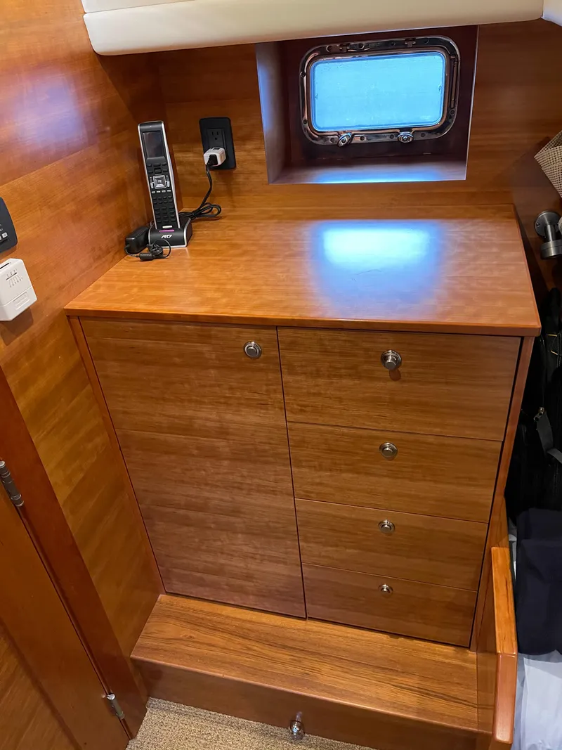 Slide: The Image of Luxurious bathroom in 2012 Coastal Craft 56 yacht with wooden cabinetry and modern fixtures. - 45