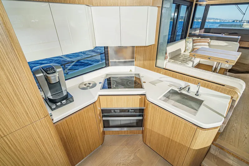Slide: The Image of Modern kitchen in 2017 Absolute NAVETTA yacht with ocean view and sleek appliances. - 10
