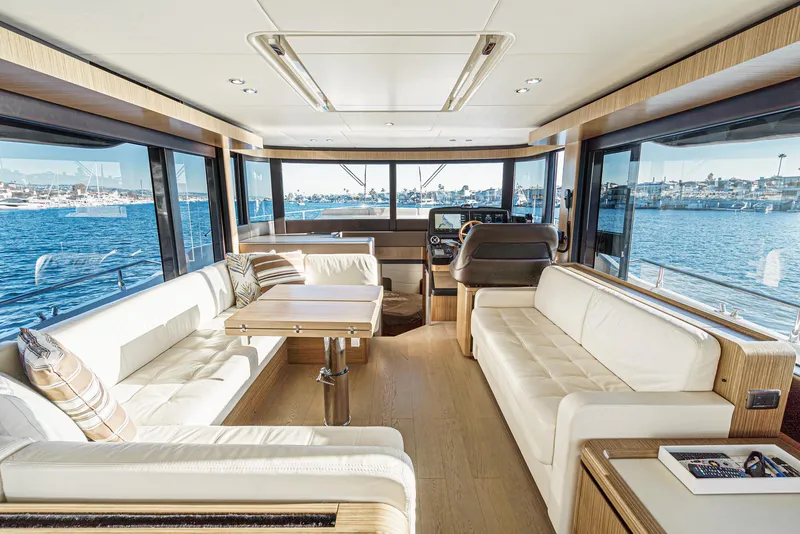 Slide: The Image of Luxurious 2017 Absolute NAVETTA yacht interior with elegant seating and panoramic windows. - 13