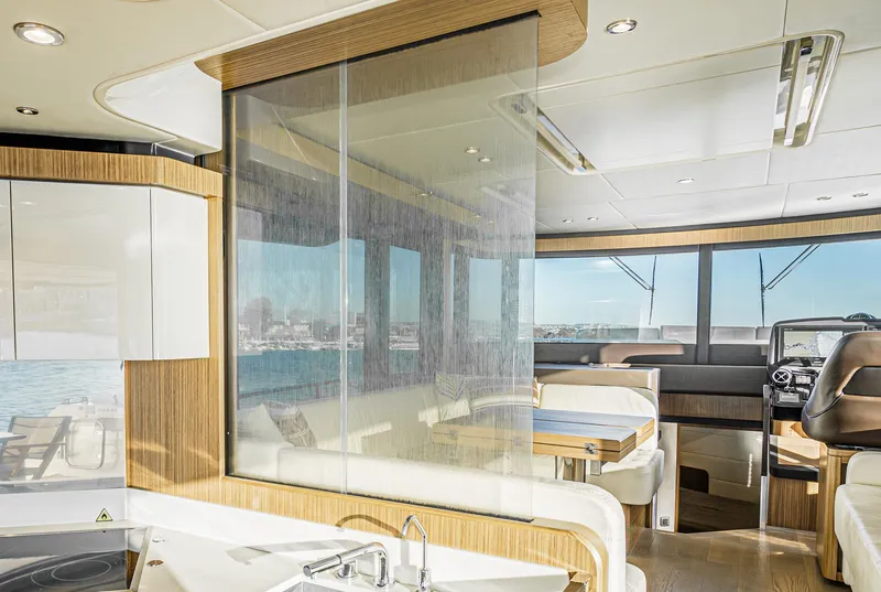 Slide: The Image of Luxurious interior of 2017 Absolute NAVETTA yacht with modern design and panoramic windows. - 16