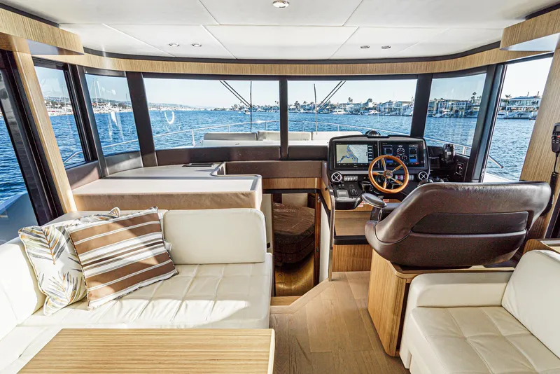 Slide: The Image of Luxurious 2017 Absolute NAVETTA yacht interior with modern helm and panoramic windows. - 20