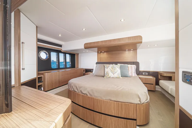 Slide: The Image of Luxurious 2017 Absolute NAVETTA yacht bedroom with modern wood design and ocean view. - 23