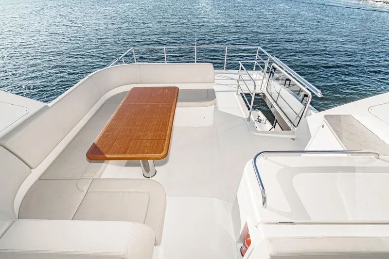 Slide: The Image of Luxury seating area on 2017 Absolute NAVETTA yacht overlooking the ocean. - 30