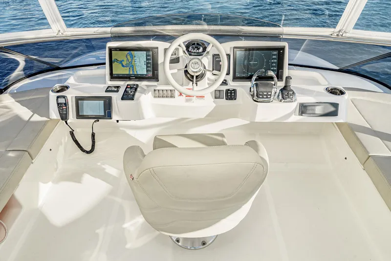 Slide: The Image of Helm of 2017 Absolute NAVETTA yacht with navigation screens and controls. - 31