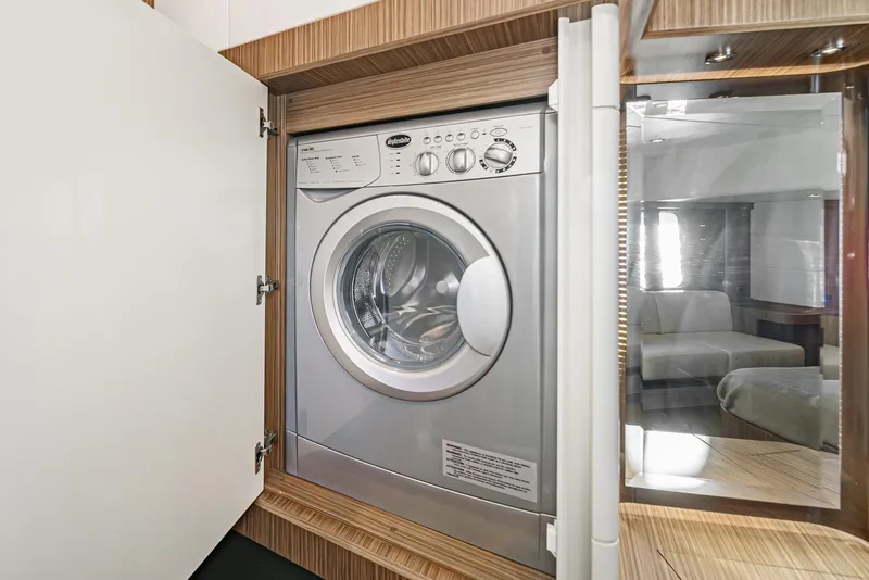 Slide: The Image of Washing machine in 2017 Absolute NAVETTA yacht interior, wooden cabinetry. - 36