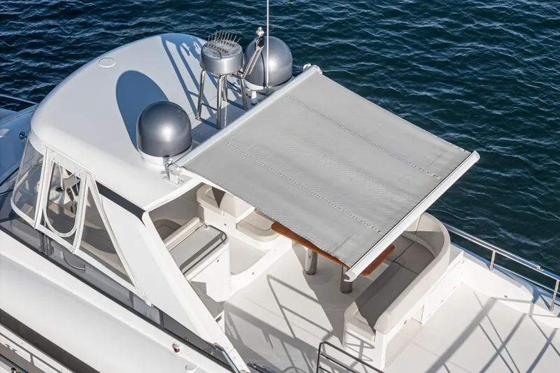 Slide: The Image of Luxury 2017 Absolute NAVETTA yacht with sunshade, top view on water. - 48