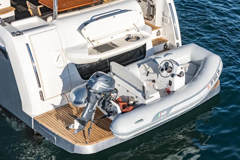 Slide: The Image of Absolute NAVETTA 2017 yacht with inflatable tender and Yamaha outboard motor on water. - 54