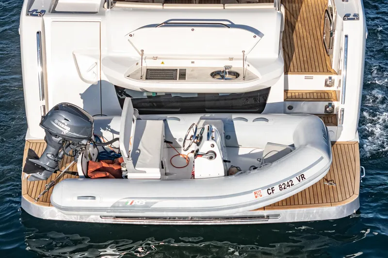 Slide: The Image of 2017 Absolute NAVETTA yacht with inflatable tender and Yamaha outboard motor. - 55