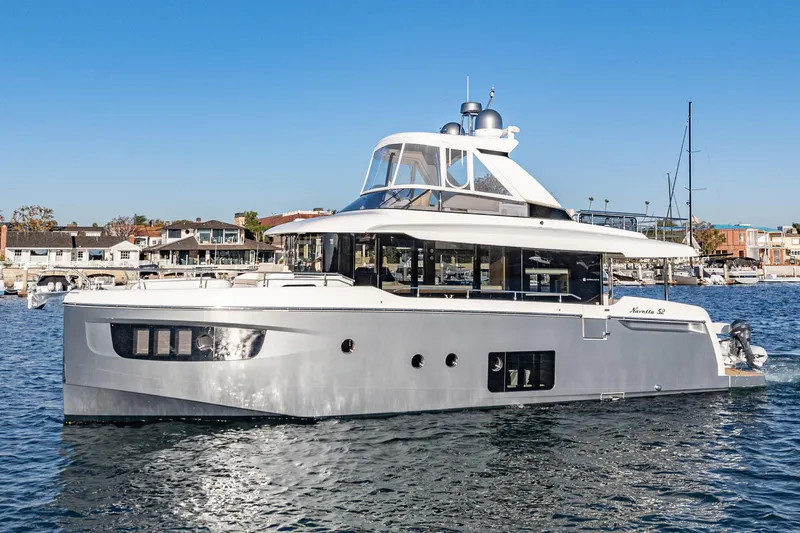 Slide: The Image of 2017 Absolute NAVETTA yacht on calm water, modern design, sunny day. - 68