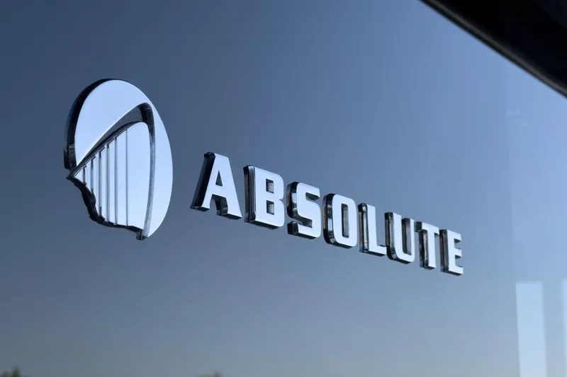 Slide: The Image of Absolute NAVETTA 2017 logo on reflective surface. - 7
