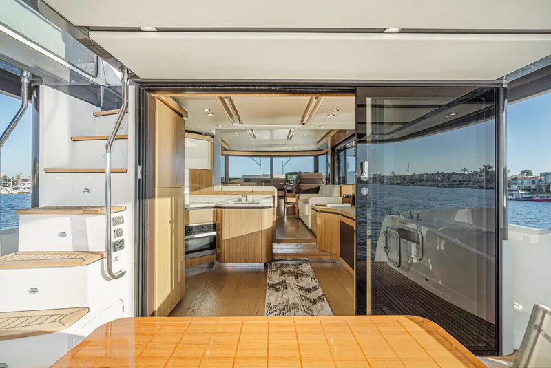 Slide: The Image of Luxurious 2017 Absolute NAVETTA yacht interior with modern design and waterfront view. - 8