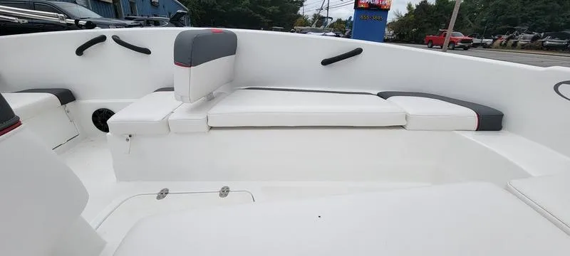 Slide: The Image of 2022 Tahoe T16 boat interior with white seating and gray accents. - 3