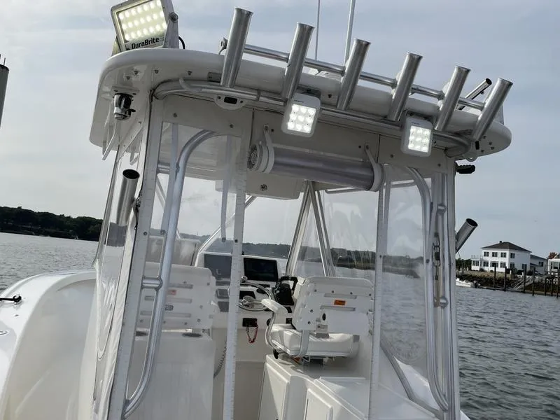 Slide: The Image of 2016 Jarrett Bay 32 Walk Around boat with fishing rod holders and LED lights. - 29