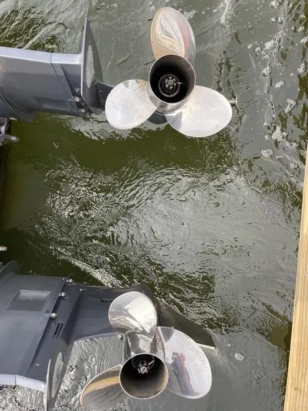 Slide: The Image of Twin propellers of 2016 Jarrett Bay 32 Walk Around on water. - 46