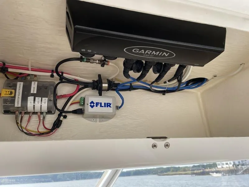Slide: The Image of Garmin and FLIR electronics in 2016 Jarrett Bay 32 WALK AROUND boat. - 9