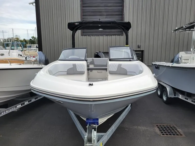 Slide: The Image of 2025 Bayliner VR6 OB boat on trailer, front view, parked outdoors. - 6
