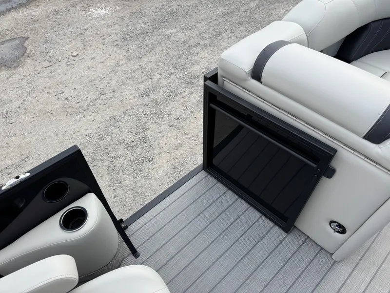 Slide: The Image of Sylvan 8520 CLZ DH 2025 pontoon boat with open storage compartment. - 16