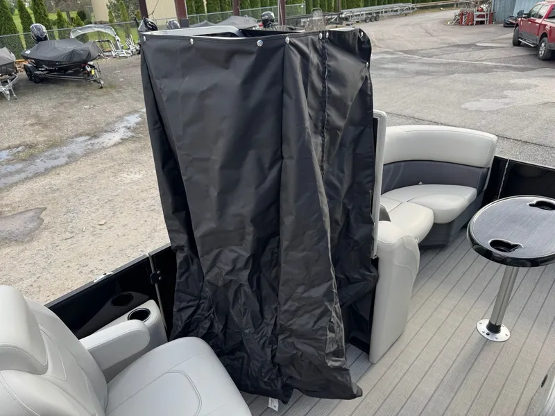 Slide: The Image of Interior of 2025 Sylvan 8520 CLZ DH with seating and curtain. - 22