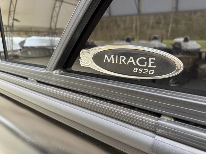 Slide: The Image of Sylvan Mirage 8520 CLZ DH 2025 boat emblem. - 26