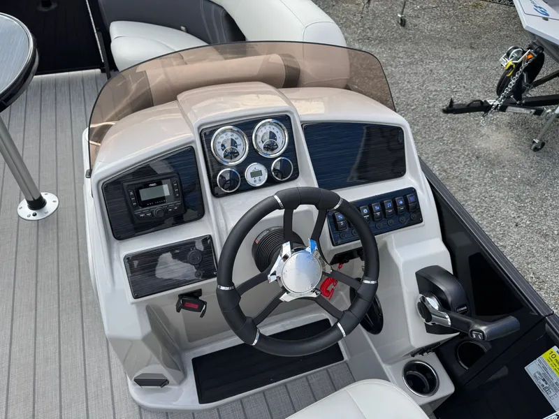 Slide: The Image of Cockpit of Sylvan 8520 CLZ DH pontoon boat, model year 2025. - 30