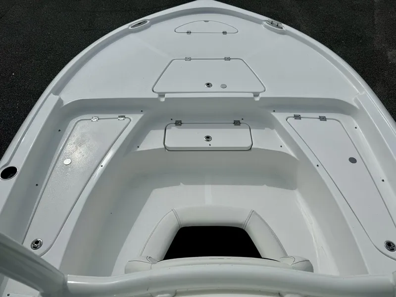 Slide: The Image of 2025 Tidewater 2210 Carolina Bay boat deck with storage compartments. - 6