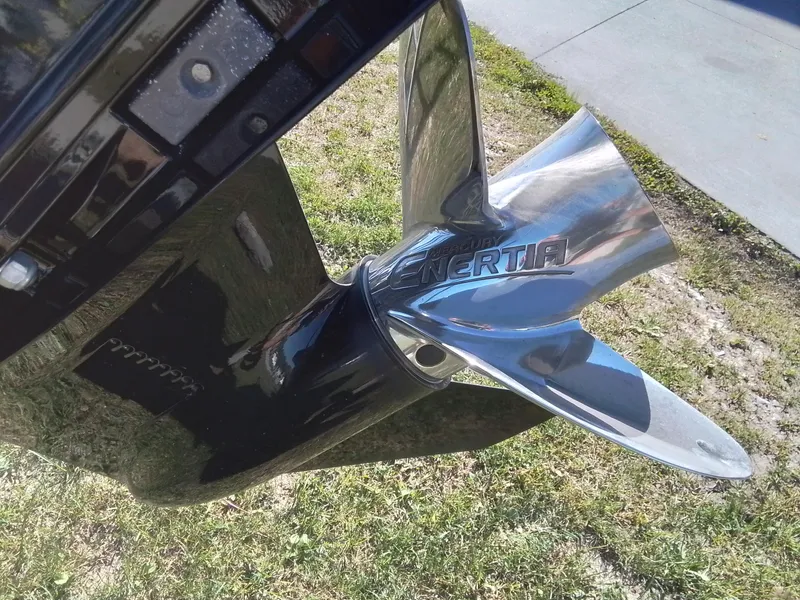 Slide: The Image of Close-up of a Mercury Enertia propeller on a 2021 Bennington Marine 24 LXSR boat. - 11