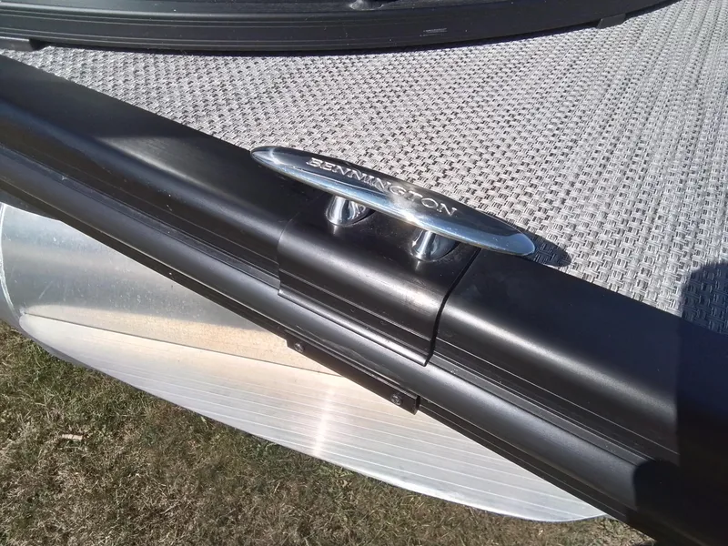 Slide: The Image of 2021 Bennington Marine 24 LXSR boat cleat on textured deck surface. - 17