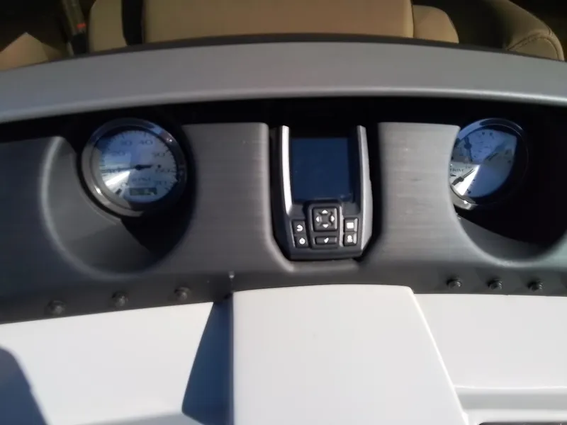 Slide: The Image of Dashboard of 2021 Bennington Marine 24 LXSR boat with gauges and controls. - 32