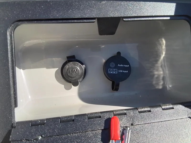 Slide: The Image of 2021 Bennington Marine 24 LXSR boat console with 12V and USB audio input ports. - 35