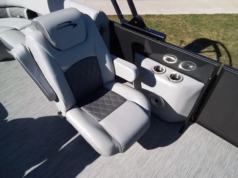 Slide: The Image of 2021 Bennington Marine 24 LXSR boat seat with cup holders and speaker. - 38