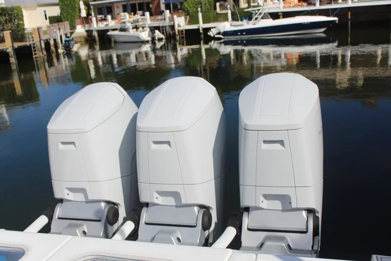 Slide: The Image of Three outboard engines on an HCB 42 Lujo boat, 2023 model. - 17