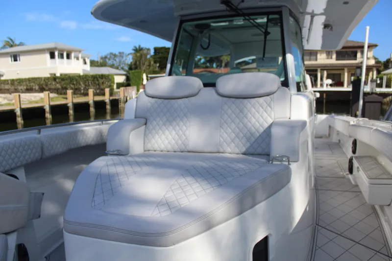 Slide: The Image of Luxurious seating area on a 2023 HCB 42 Lujo boat. - 22