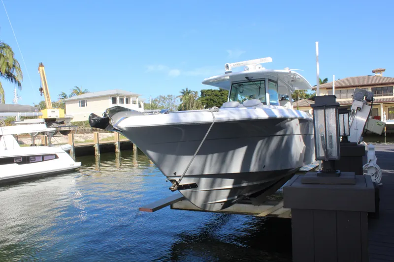 Slide: The Image of HCB 42 Lujo 2023 boat docked in sunny weather. - 25