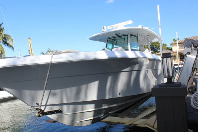 Slide: The Image of HCB 42 Lujo 2023 boat at dock, sunny day. - 28