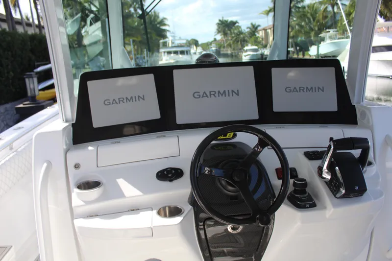 Slide: The Image of 2023 HCB 42 Lujo cockpit with Garmin displays. - 3