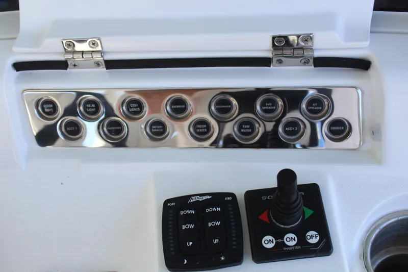 Slide: The Image of HCB 42 Lujo 2023 control panel with switches and joystick. - 4