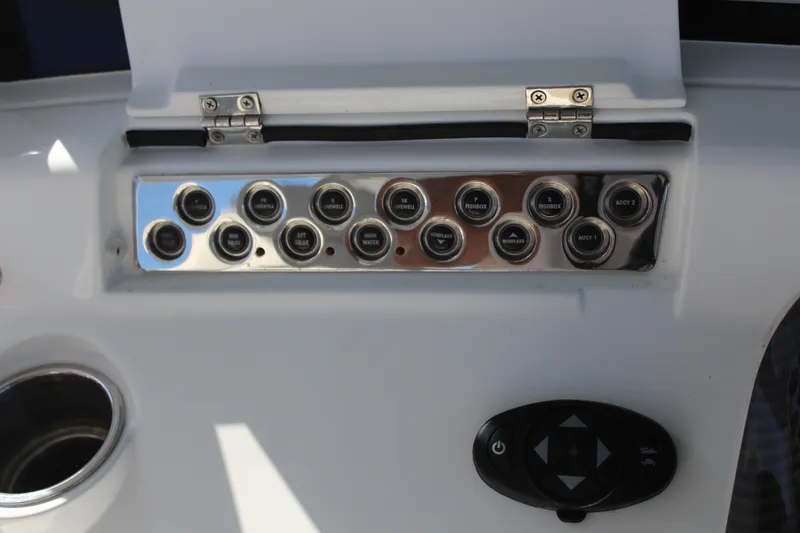 Slide: The Image of Control panel of HCB 42 Lujo 2023 with switches and controls. - 5