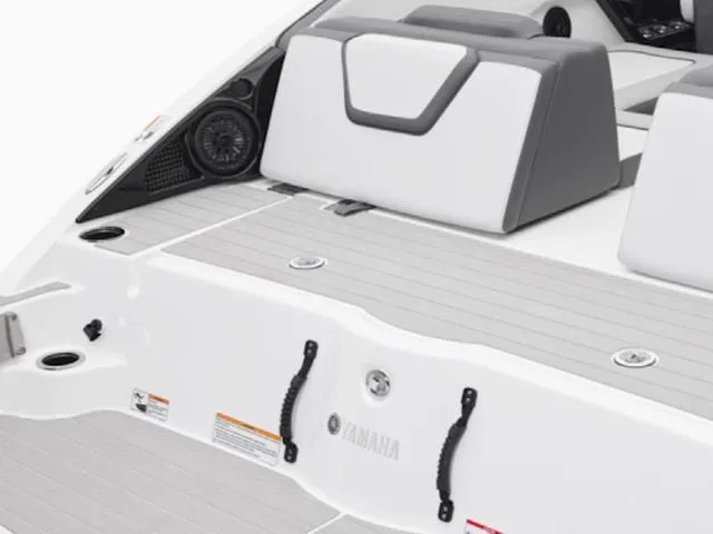 Slide: The Image of 2025 Yamaha AR250 boat interior with seating and speaker system. - 6