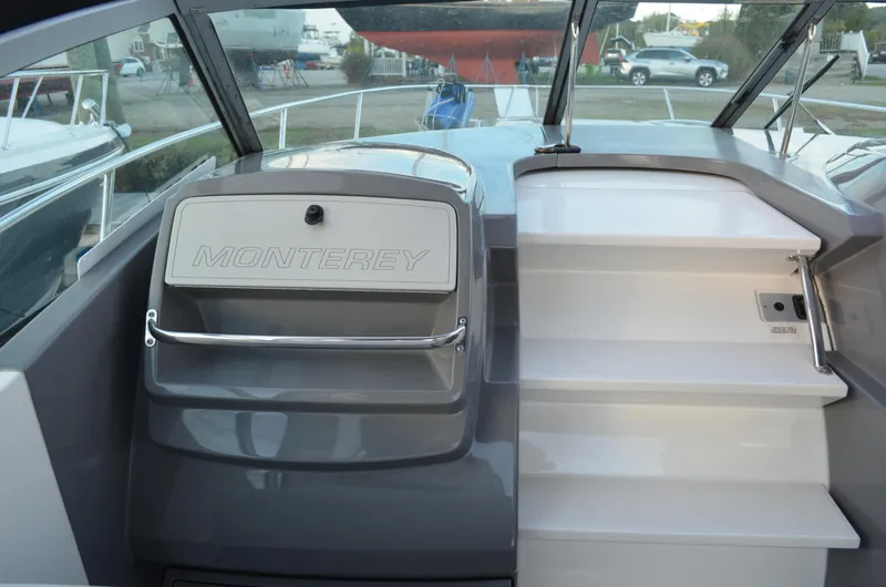 Slide: The Image of 2009 Monterey 320 Sport Yacht interior with steps and branded panel. - 20