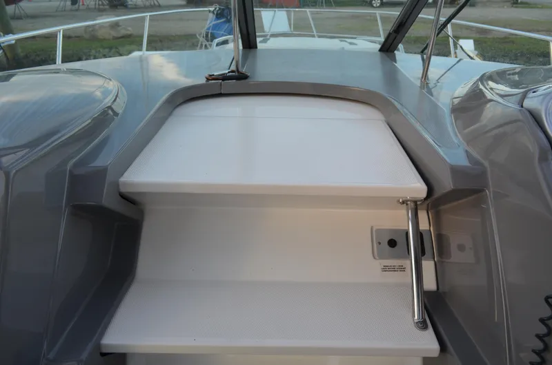 Slide: The Image of 2009 Monterey 320 Sport Yacht steps with stainless steel handrail. - 21