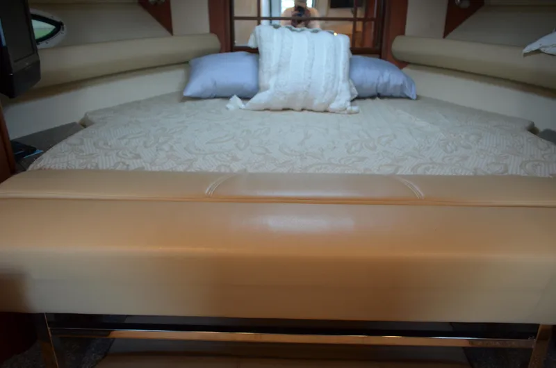 Slide: The Image of Luxurious interior of 2009 Monterey 320 Sport Yacht with comfortable bedding. - 26